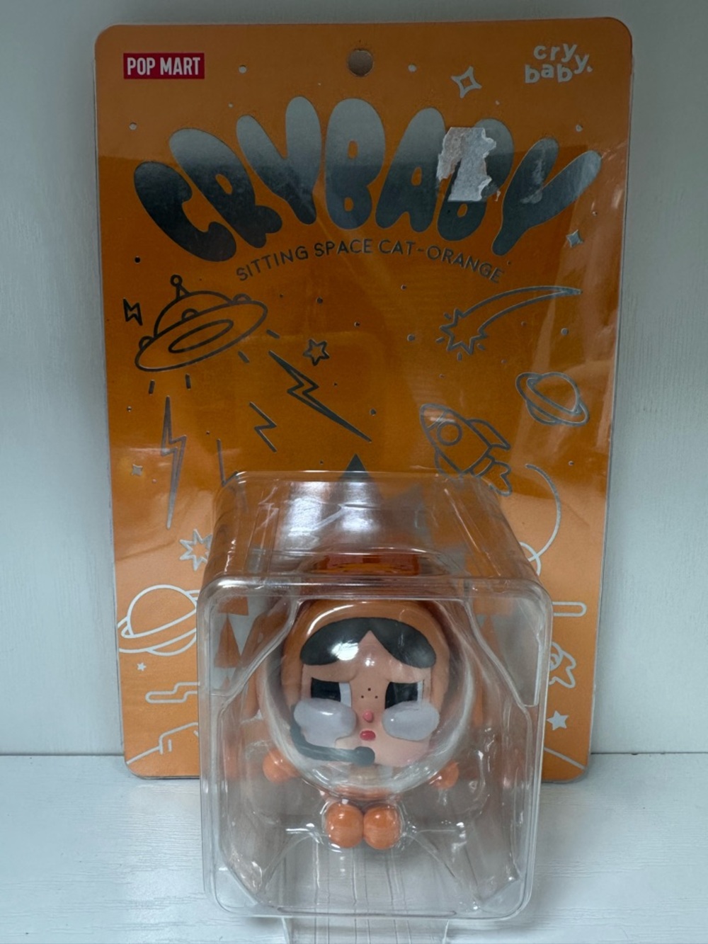 Crybaby Sitting Space Cat Orange Figure